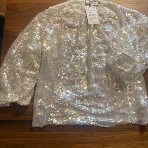 Never worn NWT  white sequin top